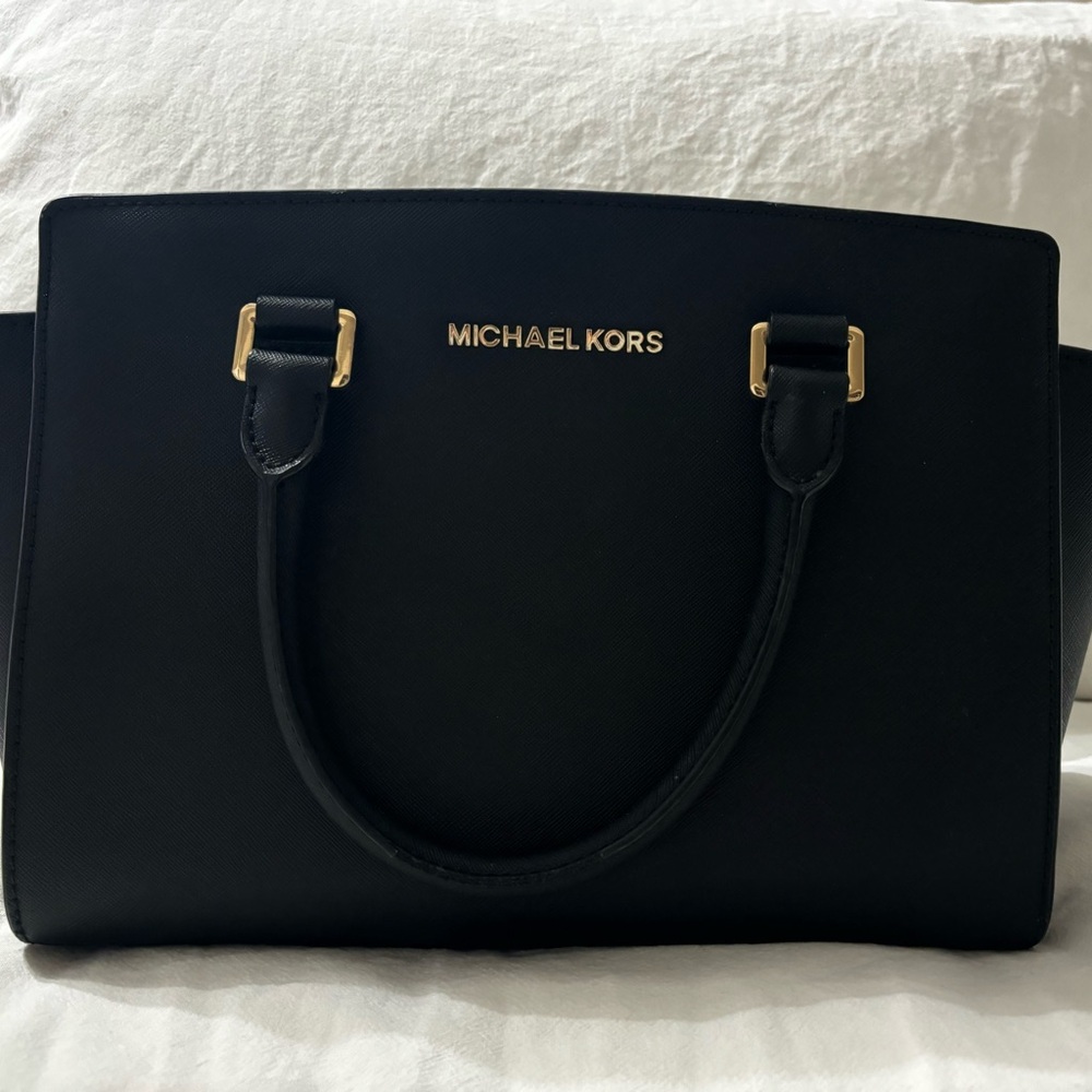Michael Kors black leather hand bag with adjustable, detachable shoulder strap